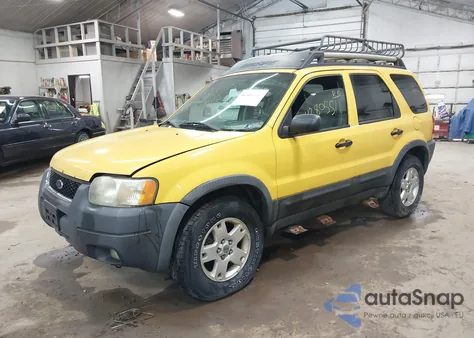 2003 Ford Escape Xlt z USA, uszkodzony, nr VIN 1FMYU93113KA13036